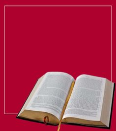 an open book sitting on top of a wooden table next to a red background with the title