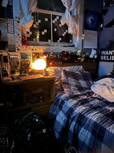 a bed room with a neatly made bed next to a window