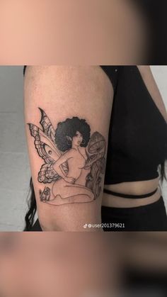 a woman with a tattoo on her arm