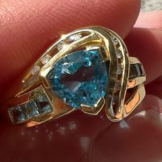 14k Yellow Gold Blue Topaz Diamond Ring In A Size 7. It Looks Brand New. It Sparkles So Much! It Weighs Approximately 4.33 Grams. The Inside Is Stamped 14k Cgj. Box Not Included. Inventory 11 Luxury Multi-stone Topaz Ring In 14k Gold, Blue Topaz Heart Cut Gemstone Rings, Heart Cut Blue Topaz Gemstone Rings, Fine Jewelry Trillion Cut Topaz Ring, Fine Jewelry Topaz Ring With Trillion Cut, Fine Jewelry Topaz Ring With Trillion Cut Gemstone, Blue Trillion Cut Ring Fine Jewelry, Blue Trillion Cut Rings In Fine Jewelry, Blue Trillion Cut Fine Jewelry Ring