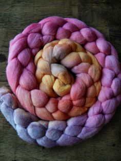 two skeins of yarn sitting on top of each other