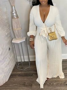 Details Care Fabric: Polyester Blend Style: Fashion V Neck, Half Sleeves, Tied Belt, Wide Leg Package: 1 x Jumpsuit Size(CM) Bust Length S 86 151 M 88 152 L 93 153 XL 98 154 2XL 103 155 3XL 108 156 4XL 113 157 5XL 118 158 Size(IN) Bust Length S 33.9 59.4 M 34.6 59.8 L 36.6 60.2 XL 38.6 60.6 2XL 40.6 61 3XL 42.5 61.4 4XL 44.5 61.8 5XL 46.5 62.2 Tips Please check size chart carefully before making payment All apparel sizes are measured manually and may have 0.5-1 inch difference.(1 inch = 2.54 cm) Chic Long Sleeve Jumpsuits And Rompers For Beach, White Tie Waist Jumpsuits And Rompers For Vacation, White Tie Waist Jumpsuits And Rompers For Beach, Elegant Long Sleeve Jumpsuits And Rompers For Vacation, Chic White Jumpsuit With Tie Waist, Solid Color Tie Waist Jumpsuits And Rompers For Beach, White Tie Waist Jumpsuit For Beach, White Beach Jumpsuit With Tie Waist, Long Sleeve Jumpsuit With Tie Waist For Day Out