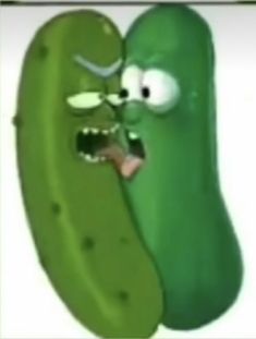 a green pickle with its mouth open and tongue out next to it's head