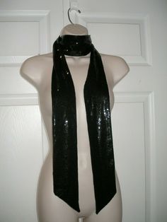 DESCRIPTION Reversible Dressy Accessory Neck Scarf SEQUIN COVERED ONE SIDE/BLACK FABRIC REVERSE Pattern: TINY SEQUINS / BLACK SHINY FABRIC Versatile Scarf than can be worn different ways MEASUREMENTS Length 70 inches Width 3 inches CONDITION Brand New Smoke free FAST SHIPMENTS FREE SHIPPING for this listing is ONLY for DOMESTIC Bidders inside the USA International bidders must pay postage and any other expenses for this purchase such as duties, taxes, and customs clearance fees. Black Neck Scarf, Y2k Scarf, Sparkly Scarf, Shiny Fabric, Black Scarf, Customs Clearance, Neck Scarf, Cute Fits, Neck Scarves