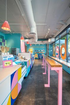 the interior of a brightly colored restaurant