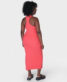 The throw-on midi your wardrobe's been waiting for. A soft, ribbed fabric made with 46% cotton . Slim fit with a flattering stretch and racerback silhouette . Features contrasting binding on the neckline and armholes for a sporty look. Front length: 122cm / 48". Model wears size L and is 178cm/5'10" tall. Style Code: SB9746Colour: Coral Pink Pink Midi Dress For Summer Beach Cover-up, Pink Non-stretch Midi Dress For Vacation, Pink Stretch One-piece Swim Dress, Pink Maxi Length Beachwear Cover-up, Pink Sleeveless Swim Dress With Built-in Bra, Ribbed Tank Dress, Running Leggings, Sporty Look, Coral Pink