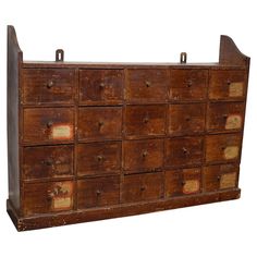 an old wooden chest with many drawers