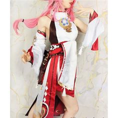 a woman with pink hair is dressed in costume