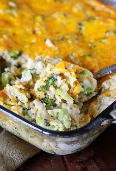 a casserole dish with broccoli and cheese