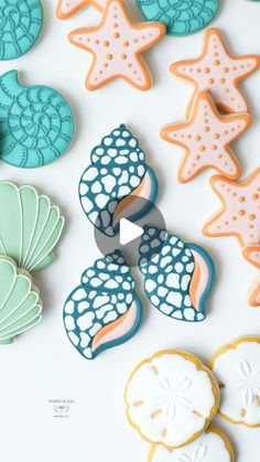 decorated cookies are displayed on a table