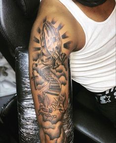 a man with a tattoo on his arm