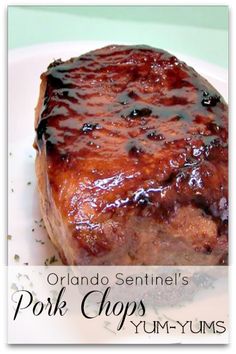 a close up of a piece of meat on a plate with text overlay that reads, orlando sentinel's pork chops