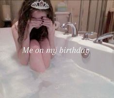 a woman sitting in a bathtub with her hands on her face and the words me on my birthday