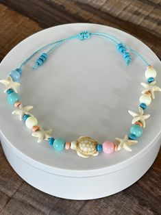 The perfect anklet or bracelet for your afternoon at the beach! Could also be used on tumblers!  Adjustable, so one size fits most. Ocean Theme Bracelet, Choker Men, Pastel Bracelet, Trashy Outfits, Preppy Bracelets, Tropical Jewelry, Beach Items, Infinity Jewelry, Jewelry Accessories Ideas