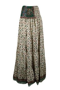 Embrace your free-spirited side with our Boho Chic Maxi Skirt, designed for the modern soul who loves to blend Beige, Green Leaf Printed Stylish comfort and style. This flowing, maxi-length skirt features vintage-inspired tribal prints and earthy tones, perfect for creating a laid-back yet hippie-style look. Handcrafted with care, the skirt boasts tiered layers and subtle, giving it a graceful, gypsy flair. Whether you're strolling on the beach or attending a festival, this relaxed-fit statement Green Bohemian Maxi Skirt With Boho Print, Bohemian Long Maxi Skirt With Floral Print, Hippie Boho Print Flowy Maxi Skirt, Hippie Style Flowy Maxi Skirt With Boho Print, Hippie Floral Print Maxi Skirt For Festival, Bohemian Floral Print Relaxed Maxi Skirt, Hippie Flowy Maxi Skirt With Boho Print, Bohemian Relaxed Fit Floral Maxi Skirt, Bohemian Floral Print Maxi Skirt For Festival