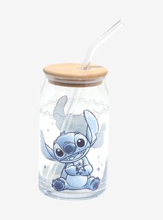 a glass jar with a straw in the lid and an image of a baby elephant on it