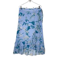 Nwt Size L Blue Floral High Waisted Wrap Skirt Lined 100% Polyester Snag On Inside Of Ruffle Approximate Measurements Across Waist 15 1/4” Blue Maxi Skirt For Brunch, Blue Wrap Skirt For Spring Beach Outings, Blue Wrap Skirt For Beach And Spring, Blue Tiered Wrap Skirt For Spring, Yellow Mini Skirt, Black Pleated Mini Skirt, White Leopard, Cargo Skirt, Purple Sweater