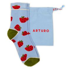 women's patterned socks with a light blue background and red strawberries, green toe and heel, and a white profile along the back of the leg: at the time of purchase, you can request a free arturo cotton bag, perfect as a gift idea for any occasion. each pair of socks comes with a spool of thread in the same color as the toe and heel for any necessary repairs. 80% COTTON 18% POLYAMIDE 2% ELASTAN WE RECOMMEND WASHING INSIDE OUT AT 30°C White Profile, Spool Of Thread, Blue C, Stocking Fillers For Her, Red Strawberry, Light Blue Background, Patterned Socks, Mens Jewelry Bracelet, Independent Designers Fashion