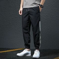 Applicable Season : Spring and Autumn Applicable Scene : Casual Fabric Type : Broadcloth Model Number : Casual Pants for Men Closure Type : Drawstring Decoration : AppliquesWaist Size(in inches) : 1.9 - 4 Front Style : Flat Item Type : full length Length : Ankle-Length Pants Thickness : midweight Fit Type : LOOSE Style : Youthful vitality Material : POLYESTER,Acetate,Other Gender : MEN Pant Style : Cargo Pants Waist Type : highBrand Name : Huaxidairy Please note 1 cm = 0.39 inch,1 inch = 2.54 cm Black Techwear Joggers For Outdoor Activities, Black Casual Joggers For Outdoor, Black Joggers With Pockets For Outdoor, Casual Black Joggers For Outdoor, Black Trousers For Outdoor Activities, Winter Black Joggers With Pockets, Winter Black Joggers With Side Pockets, Baggy Black Joggers For Outdoor, Black Joggers With Side Pockets For Outdoor Activities