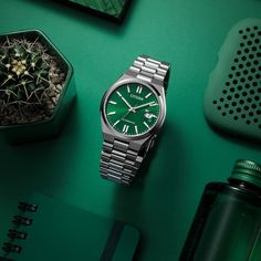 Redefine sophistication with the modern sporty design of this men's Citizen Tsuyosa Collection automatic watch with a green sunray dial. The green sunray dial showcases luminous silver-toned hands and markers, and a date display at 3 o'clock. 40.0mm brushed stainless steel case with anti-reflective sapphire crystal Automatic movement keeps accurate time. The stainless steel bracelet features polished and brushed links and secures with a fold-over clasp. Water resistant to 50 meters, this watch includes a 5-year limited manufacturer warranty, with an additional 1-year warranty when you register your watch with Citizen. We are an authorized Citizen dealer. Citizen Tsuyosa, Green Watch, Citizen Watch, Matching Bracelet, Diamond Shop, 3 O Clock, Sophisticated Design, Matching Bracelets, Stainless Steel Watch