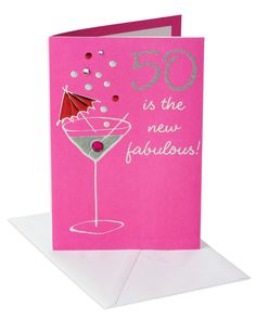 a pink greeting card with the words 50 is the new fabulous on it and an umbrella