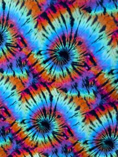 an abstract tie - dyed background with many colors