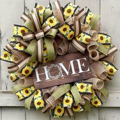 a sunflower wreath with the word home on it