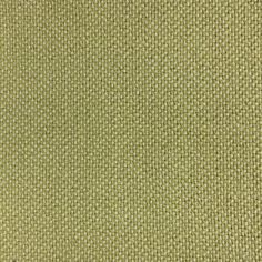 an upholstered green fabric textured with small squares