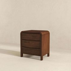 a small wooden table with two drawers on one side and an open drawer on the other