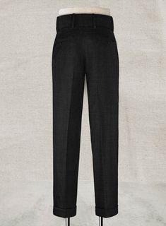 Be the best-dressed in order to be a gentleman that demands perfection. Crafted from wool blend, our Napoleon Black Stone Double Gurkha Wool Trousers are elegant with a smooth and rich effect that exudes style and utmost comfort. An essential pants for your wardrobe which will make your ensemble exceptional. 
 
 Look Includes  Napolean Stone Black Wool Fabric  Cross Pocket  Two Pleated Front  Double Button Fastening Wide Waistband  Diamond Pocket On Right  1.5inch Trouser Cuffs  Two Welted Back Formal Straight Leg Bottoms For Winter, Straight Leg Bottoms For Formal Winter Wear, Straight Leg Bottoms For Formal Winter Occasions, Formal Full-length Bottoms For Winter, Full Length Formal Bottoms For Winter, Elegant Wool Pants For Winter, Elegant Wool Bottoms For Winter, Fitted Full-length Dress Pants For Winter, Classic Winter Pants With Straight Hem