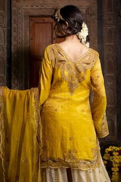 Yellow kurta with thread dori embroidered floral swirl motifs, embellished by beads, placed cutwork and scalloped hem. Comes with embroidered beige sharara and dupatta. - Aza Fashions Festive V-neck Salwar Kameez For Wedding, Wedding Dupatta With Zari Work, V-neck Salwar Kameez With Dabka Work For Wedding, Semi-stitched V-neck Salwar Kameez For Wedding, Wedding Salwar Kameez Semi-stitched V-neck, V-neck Salwar Kameez For Diwali Wedding, V-neck Salwar Kameez For Wedding And Diwali, V-neck Salwar Kameez For Wedding And Eid, Festive Palazzo Set With V-neck For Wedding