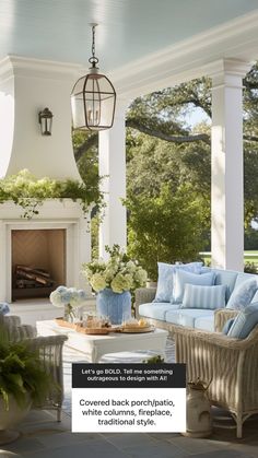 an outdoor living room with blue and white furniture