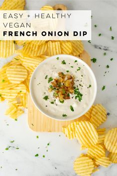 french onion dip in a bowl surrounded by chips on a cutting board with the words easy and healthy vegan