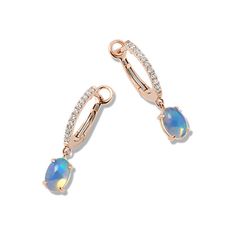 Natural opals dangle from these gorgeous drop earrings while natural diamonds decorate their secure hinged closure. Crafted in vivid 14-karat rose gold  these earrings offer a shimmering  luminous look. To care for natural opals  gently clean in warm water with mild detergent and a soft toothbrush or cloth. Avoid bleach  chemicals  cleaners  and rapid temperature changes. Soft Toothbrush, Diamond Drops, Diamond Drop Earrings, Natural Opal, Warm Water, Chemicals, Natural Diamonds, Bleach, Opal