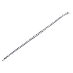 Iconic Art Deco platinum tennis bracelet, crafted by Cartier Paris, set with graduated in size old mine cut diamonds - total approx. 5cts G/VS-Si. Bracelet is 7 1/8" long and 4.3mm wide at the center (widest) point. Marked with faint hallmarks Cartier Paris and partially polished off serial number " LC L S" New York. Weight of the piece - 15.7 grams. Iconic Art, Bracelet Tennis, Old Mine Cut Diamond, Tennis Bracelet, Yorkie, Cartier, Diamond Cuts, Platinum, Jewelry Bracelets