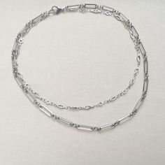 "A minimal stainless steel layered necklace. This chunky chain necklace is made from two lengths of stainless steel chain (the colour is not bright, unlike silver equivalents). This necklace is perfect as a gift for someone special in your life or treating yourself. Great for layering or can be worn on its own. Please note that the chains are joined together at the back and this is not a listing for two separate necklaces. Necklace length options: - 14\" and 16\" (approx. 35.5 cm and 40.5 cm) - 16\" and 18\" (approx. 40.5 cm and 45.5 cm) This necklace is made to order. Packaging: Please choose your packaging type from the drop down menu.                   - Pink card envelope (as shown in the listing photo)                    - White gift box (gift wrapped with tissue paper and a satin bow Paper Clip Chain Necklace, Order Packaging, Chunky Chain Necklace, Chunky Chain Necklaces, Turquoise Boho, Pink Cards, Lovely Earrings, Pink Earrings, Multi Strand Necklace