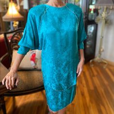 Former Upscale Boutique Owner Offering Carol Peretz Turquoise French Silk Jacquard 2pctunic Top Has Dolman Long Sleeves Whose Seams Are Silver “Beaded Whip-Stitched” As Well As The Tunic Hem And Pull-On Slim Skirt Hem Such An Impressive But Subtle Detailsleeves Push Up For Ease And Inverted Back Pleat Creates A Floaty Appearance From The Back..Perfect For “Mother Of Bride/Groom” Or For Wanting To Be Comfortable At That Cocktail Party!! Gorgeous Vintage Piece From The 80’s Never Worn Only Admired Blue Silk Evening Set, Blue Silk Evening Sets, Elegant Turquoise Cocktail Dress, Turquoise Silk Dress For Spring, Long Sleeve Navy Dress, Wear Black Dresses, Sweetheart Neckline Dress, Black Long Sleeve Sweater, Boutique Owner