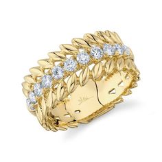 This fashion ring features a stunning laurel wreath design crafted in 14K yellow gold. It is adorned with sparkling diamonds, adding a touch of glamour to your look. Perfect for special occasions or everyday wear. Luxury Yellow Gold Stackable Rings With Decorative Band, Luxury Yellow Gold Ring With Decorative Band, Luxury Yellow Gold Rings For Anniversary, Luxury Gold Diamond Ring With Decorative Band, Luxury Yellow Gold Stackable Diamond Rings, Luxury Yellow Gold Plated Stackable Rings, Luxury Yellow Gold Rings For Evening, Luxury Gold Diamond Party Ring, Luxury Yellow Gold Double Band