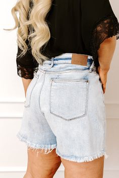 - These frayed shorts fit like they were made for you! - This distressed jean skirt was made for your trendy wardrobe! - Unlined stretchy denim material - A high waistline with belt loops, a hidden zip fly, and button closure - Functional front and back pockets - A relaxed yet flattering silhouette that ends in an unfinished frayed hemline Trendy Light Wash Jean Shorts With Belt Loops, High Waist Light Wash Jean Shorts With Belt Loops, Light Wash Shorts With Belt Loops For Spring, Spring Light Wash Shorts With Belt Loops, Mid-rise Light Wash Jean Shorts With Belt Loops, Light Wash High-waisted Jean Shorts, High Waist Light Wash Jean Shorts, High-waisted Light Wash Jean Shorts With Belt Loops, Light Wash Jean Shorts With Belt Loops For Spring