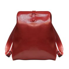 a red leather backpack on a white background