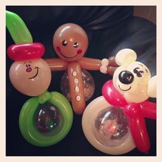 an assortment of balloon toys sitting on a chair