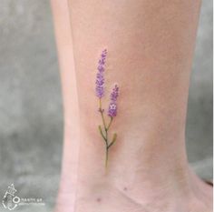 small lavender flower tattoo on the ankle