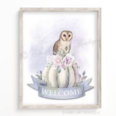 an owl sitting on top of a pumpkin with the words welcome written in blue ribbon