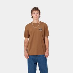 Color: Hamilton Brown - The S/S Brown Ducks T-Shirt is woven from lightweight organic cotton jersey in a loose fit. Graphic prints appear on the chest and back. _* 100% Cotton, Loose fit, Short sleeves, Graphic prints Carhartt Wip, Ducks, Workout Shorts, Graphic Prints, Loose Fitting, Organic Cotton, Short Sleeves, T Shirt, Color