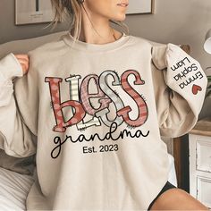 Blessed Grandma Sweatshirt, Custom Grandma And Kids, Grandma Gift TH Sweatshirt Suitable for many occasions such as Christmas, Father's Day, Mother's Day, birthday This classic crew-neck sweatshirt is an essential basic item for anyone’s wardrobe. The ribbed cuffs on the sleeves and waist are reinforced, and the high-quality cotton ensure that anyone will enjoy this cuddly and cool sweatshirt for many moons to come. Preshrunk fleece knit Double-needle stitching at shoulder, armhole, neck, waistb Blessed Grandma, Custom Embroidered Sweatshirt, Grandma Sweatshirt, Grandma Gift, Hoodie Material, Embroidered Sweatshirt, Cozy Fits, Embroidered Sweatshirts, Grandma Gifts