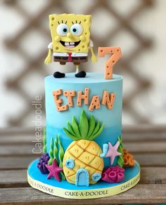 a birthday cake with an image of spongebob on top and the number seven