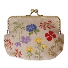 a small purse with flowers on it