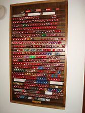 a wall mounted game board with lots of dices on it