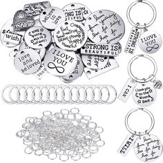 lots of different types of key chains and charms with words on them, including i love you to the moon and back