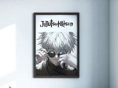 an anime poster hanging on the wall above a bed